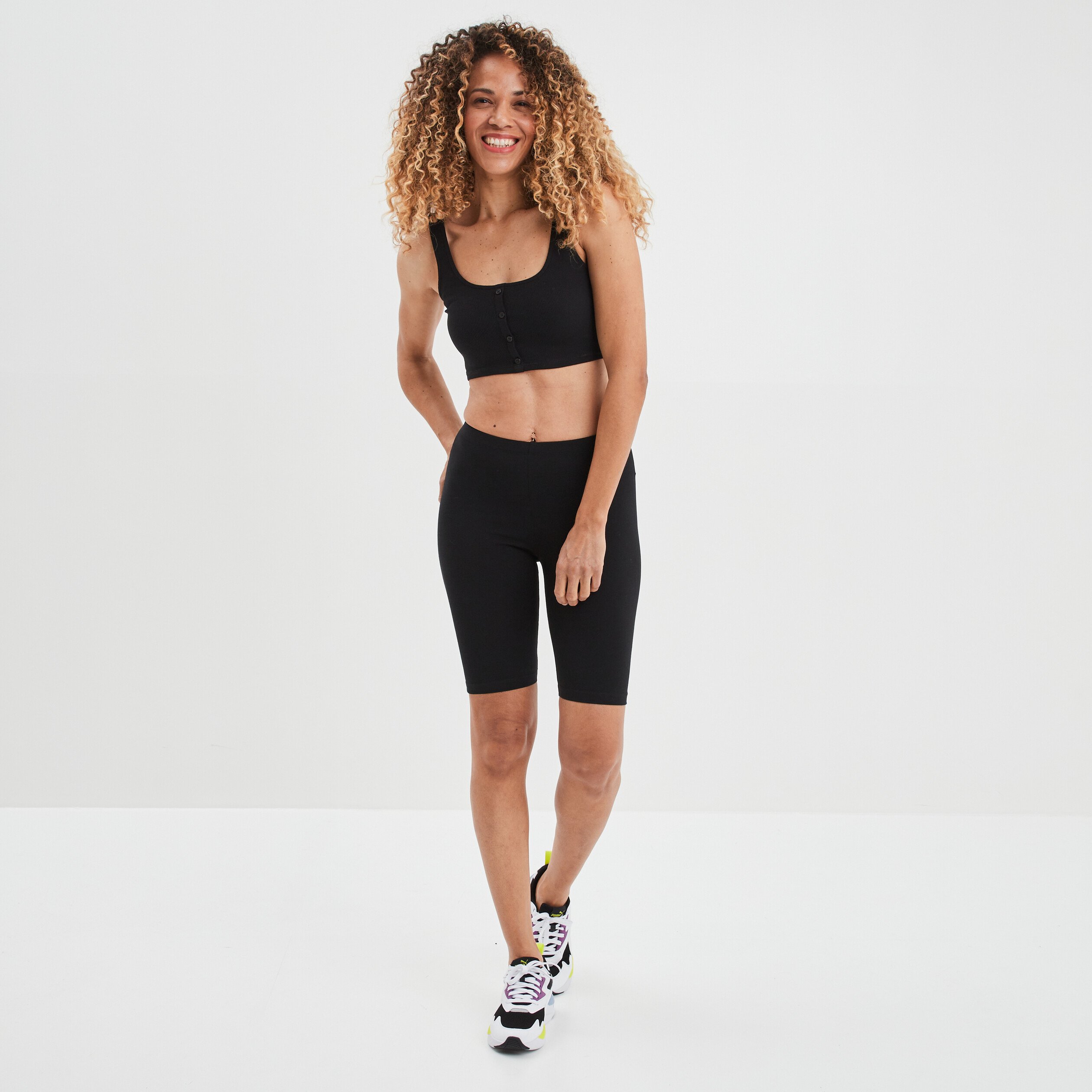 Legging court cycliste ajuste noir femme